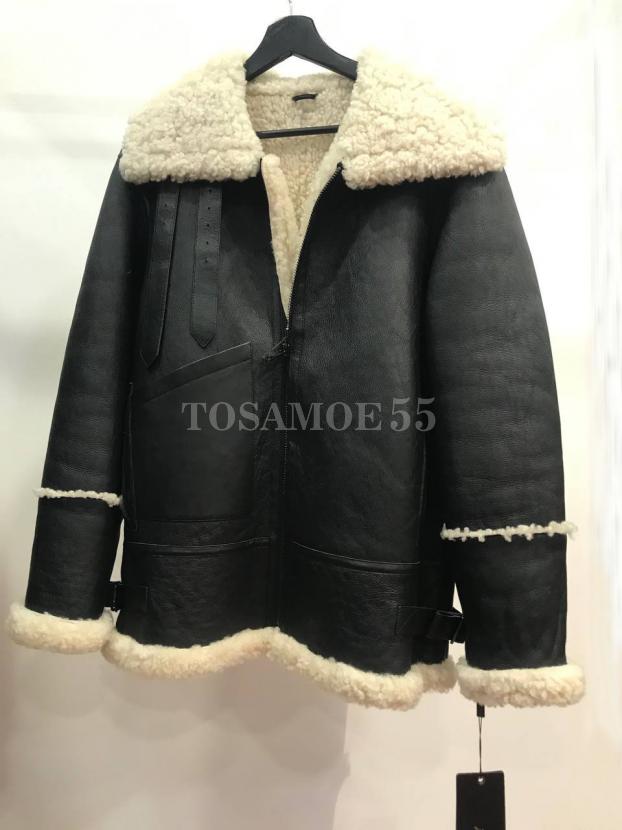 Черная укороченная дубленка с белым мехом фото №1